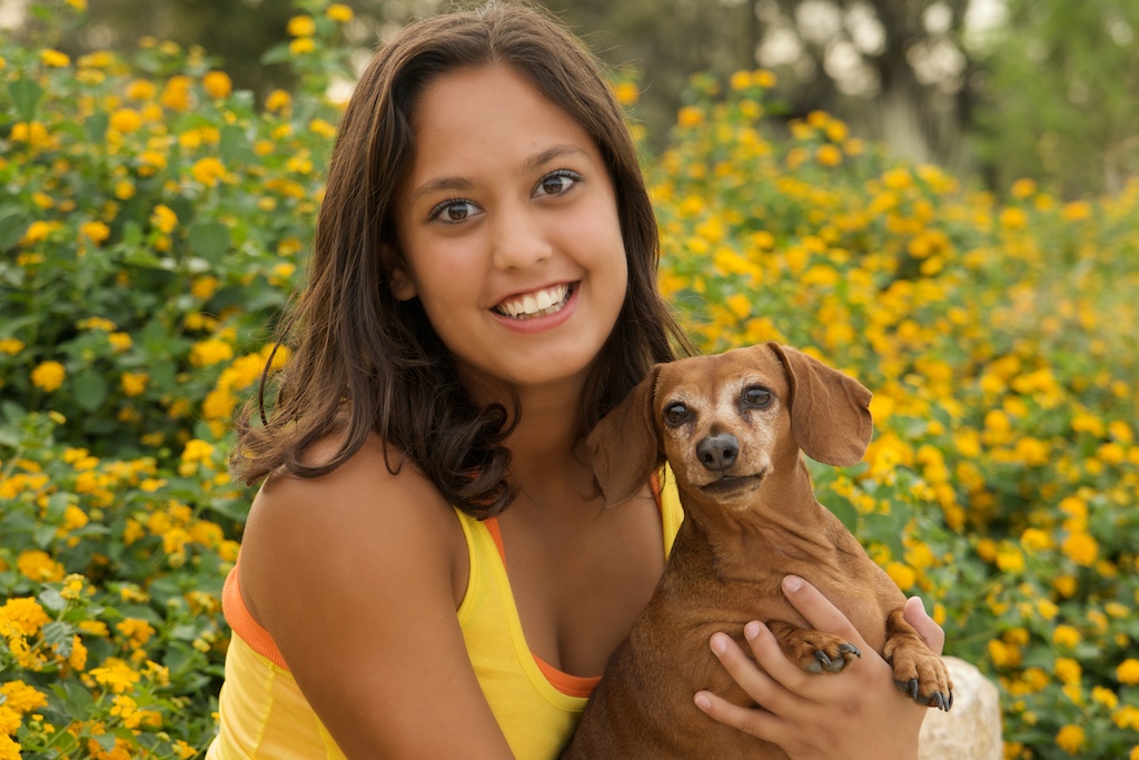 Lovely brunette senior girl with her favorite pooch!