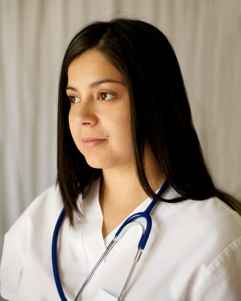 Beautiful young nursing school graduate